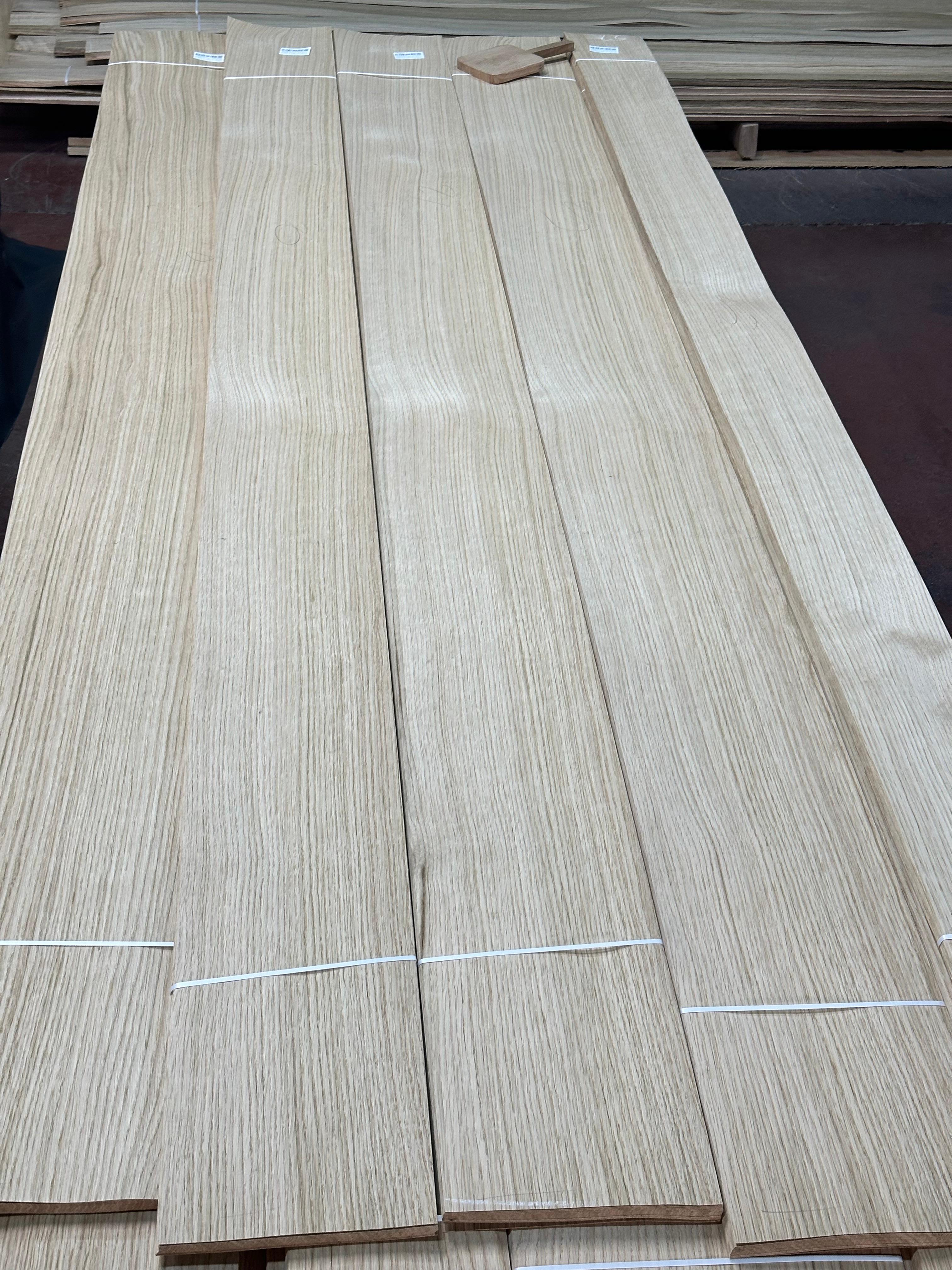Expertly sliced hardwood veneers showing rich grain patterns